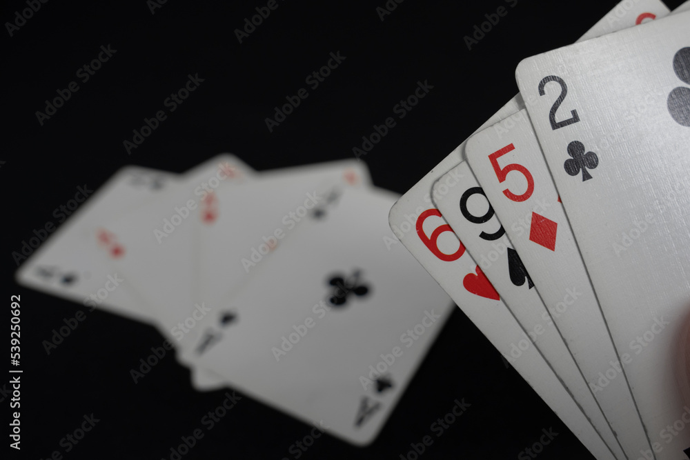 Obraz premium playing cards. no luck. bad alignment. black background