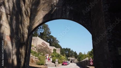 Baiona, Sapin, August 26, 2022: PAN SHOT - Barbeira Beach and Monte Real Club de Yates viewed from the Historical Castle of Monterreal on the Monte Boi peninsula. photo