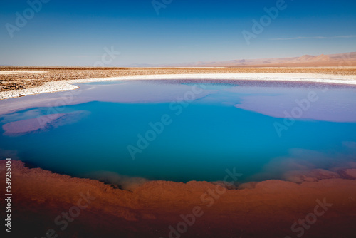 Salar de Atacama volcanic landscape and salt lake in Atacama Desert, Chile © Aide