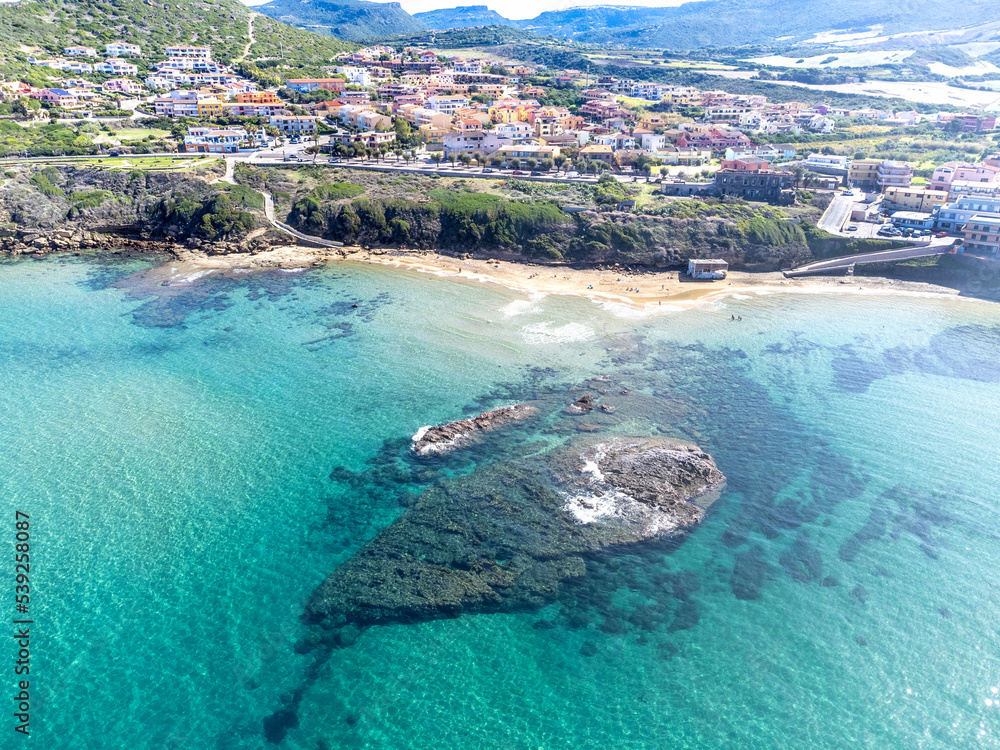 Aerial view of Lu Bagnu colorful shoreline