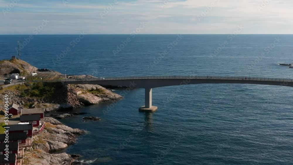 Aerial drone view of Hamnoy in Lofoten islands in Norway on a sunny day. Fjords and mountains at sunset 