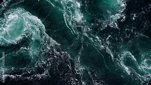 Footage of abstract water currents, rapids and whirlpools in fjord. Saltstraumen Norway