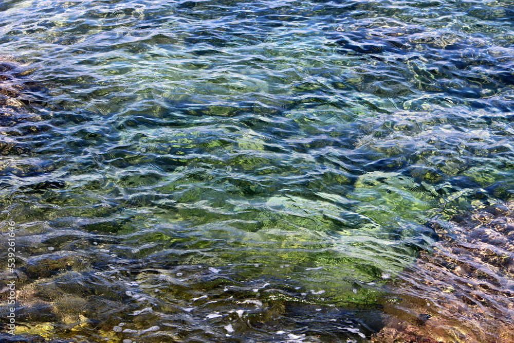 The color of the water in the mediterranean sea in shallow water