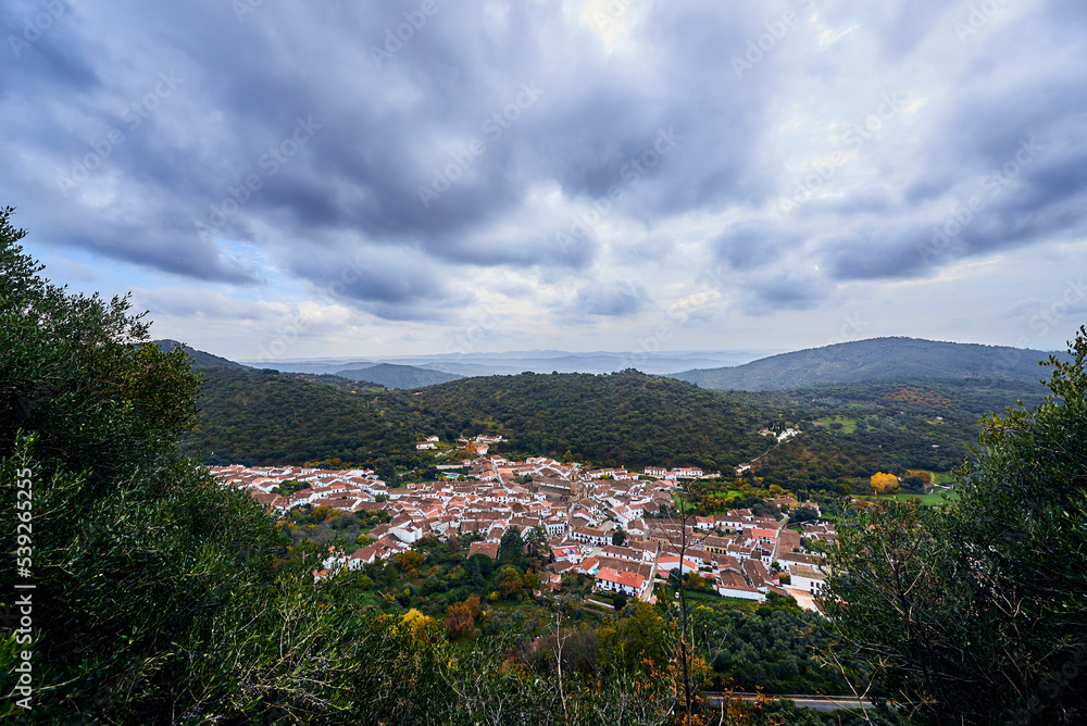 Mountain village with cloudy skies