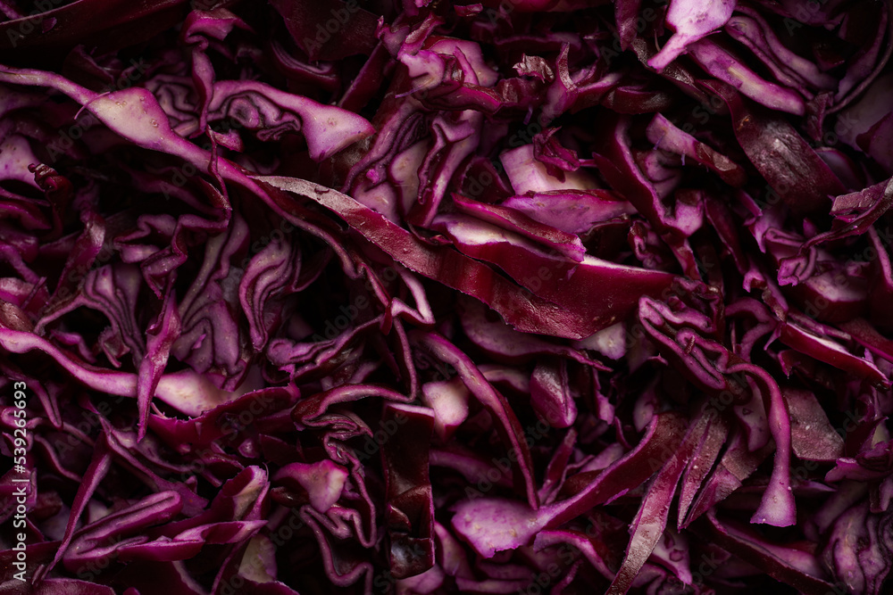 German red cabbage chopped in fine stripes filling the frame, a background German red cabbage chopped in fine stripes filling the frame, a background