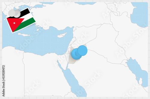 Map of Jordan with a pinned blue pin. Pinned flag of Jordan.