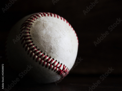 Photography Baseball photographed in natural light with a dark background