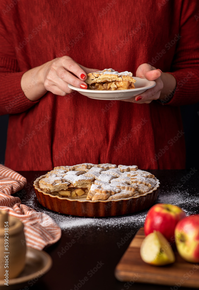 Food photography of apple pie, pastry, dessert, powder, sugar, hand, woman, towel