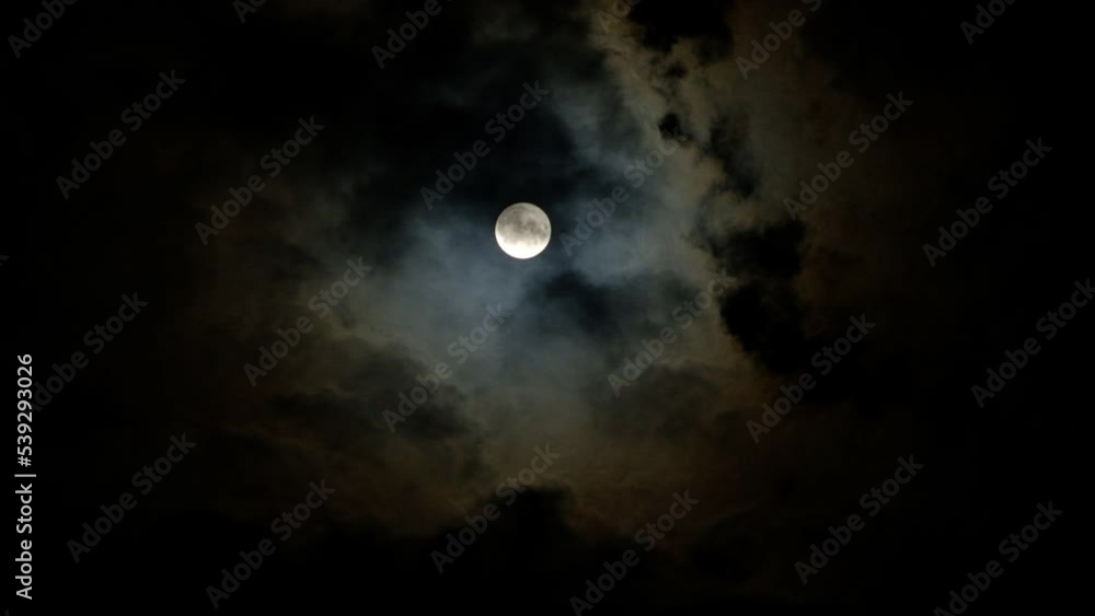 full moon in the cloudy sky full moon in the cloudy sky