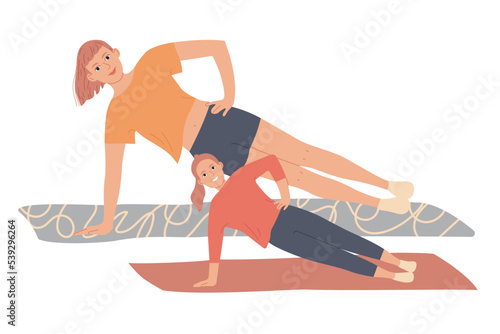 Mother and daughter exercise at home and make a side plank