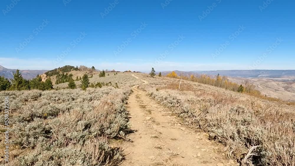 Autumn ride across mountain trail POV 3 4K. Beauty of seasonal Autumn colors exploring high mountain roads and trails. Riding sports vehicle 4x4 4 wheel drive. High mountain and valley. Fall colors Autumn ride across mountain trail POV 3 4K. Beauty of seasonal Autumn colors exploring high mountain roads and trails. Riding sports vehicle 4x4 4 wheel drive. High mountain and valley. Fall colors