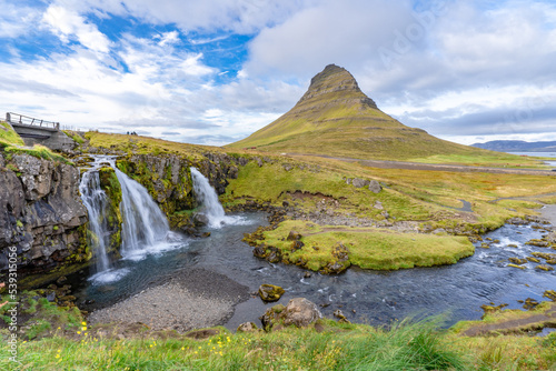 Scenic waterfalls at Kirkjufell mountain in Iceland