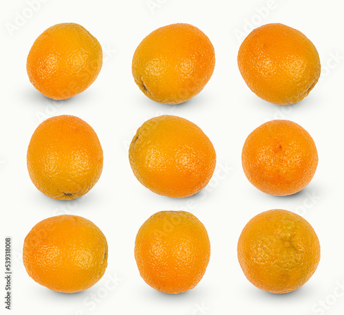 Nine lime oranges isolated on white background