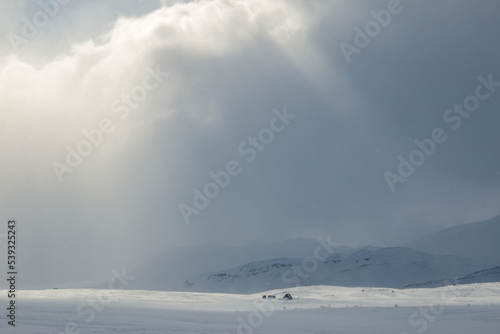 An emergency hut on Kungsleden skiing trail between Abiskojaure and Alesjaure, winter season, Lapland, Sweden © Alena V
