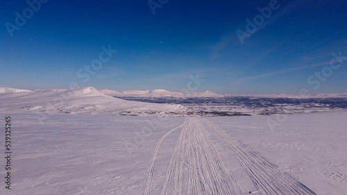 A snowmobile and skiing part of Kungsleden trail between Hemavan and Ammarnas, March, Lapland, Sweden
