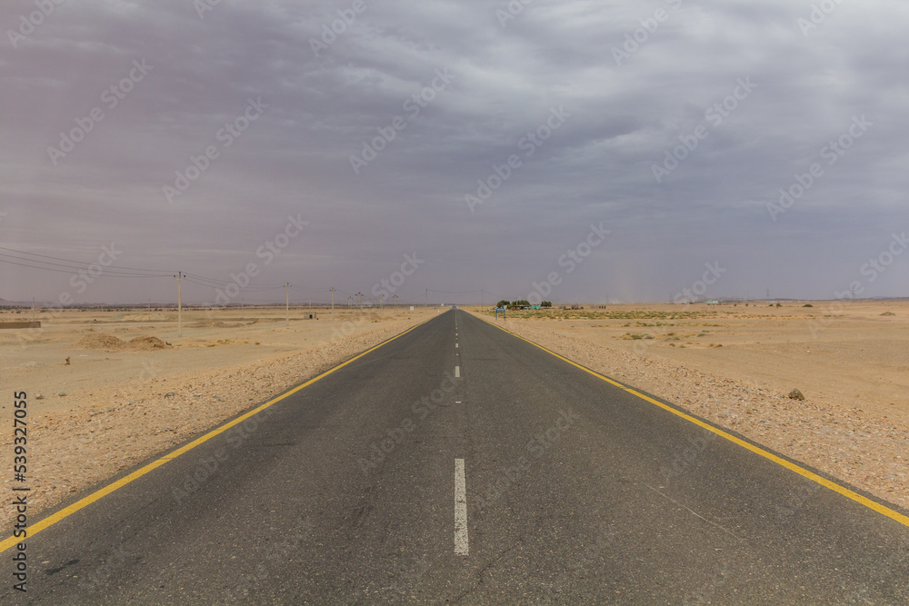 Straight desert road in northern Sudan