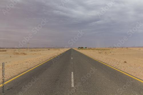 Straight desert road in northern Sudan