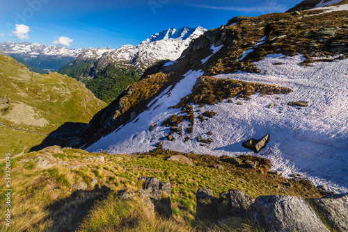 Snowcapped mountains, Alpine landscape at golden sunset, Gran Paradiso, Italy