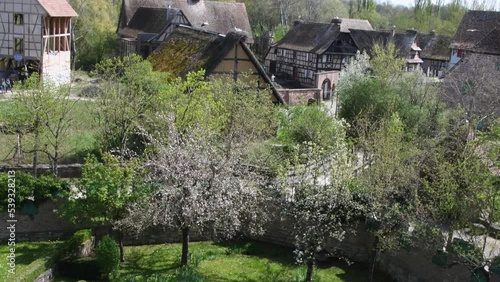 Traditional old alsatian houses in the Ecomuseum Alsace in city of Mulhouse, Alsace, France photo