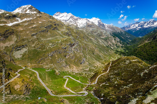 Alpine mountain road and dramatic landscape at springtime, Gran Paradiso, Italy