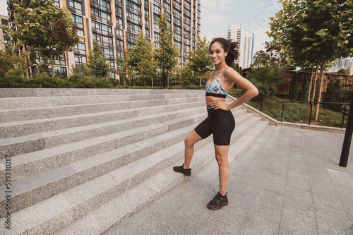 Girl in tight sports shoerts working hard on a workout