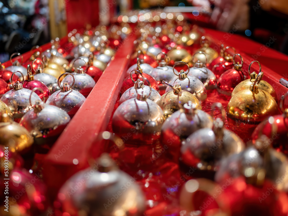 A lot of Christmas baubles on the Christmas market A lot of Christmas baubles on the Christmas market