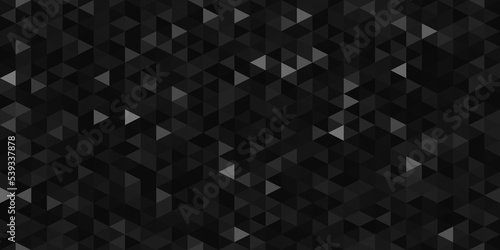 Seamless rich luxe black triangle mosaic pattern backdrop. Tileable dark charcoal grey low poly twinkling geometric polygon background texture with copy space. 8k desktop wallpaper 3D Rendering..