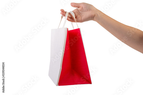 Hand Holding Paper Bag isolated on transparent background.