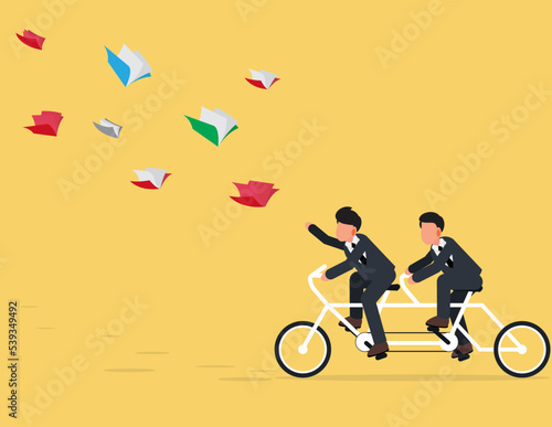 Learning aspiration concept. two businessmen riding bicycles following a flying book