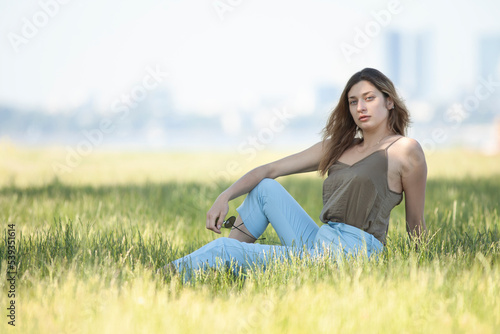 Young beautiful smiling woman outdoors