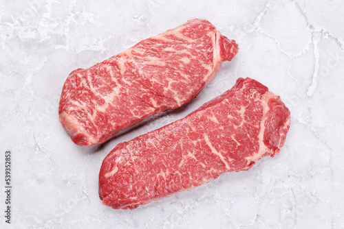 Prime marbled beef steaks. Raw striploin steak