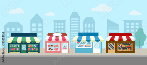 City street with food shop, drug store and bookstore in flat design.