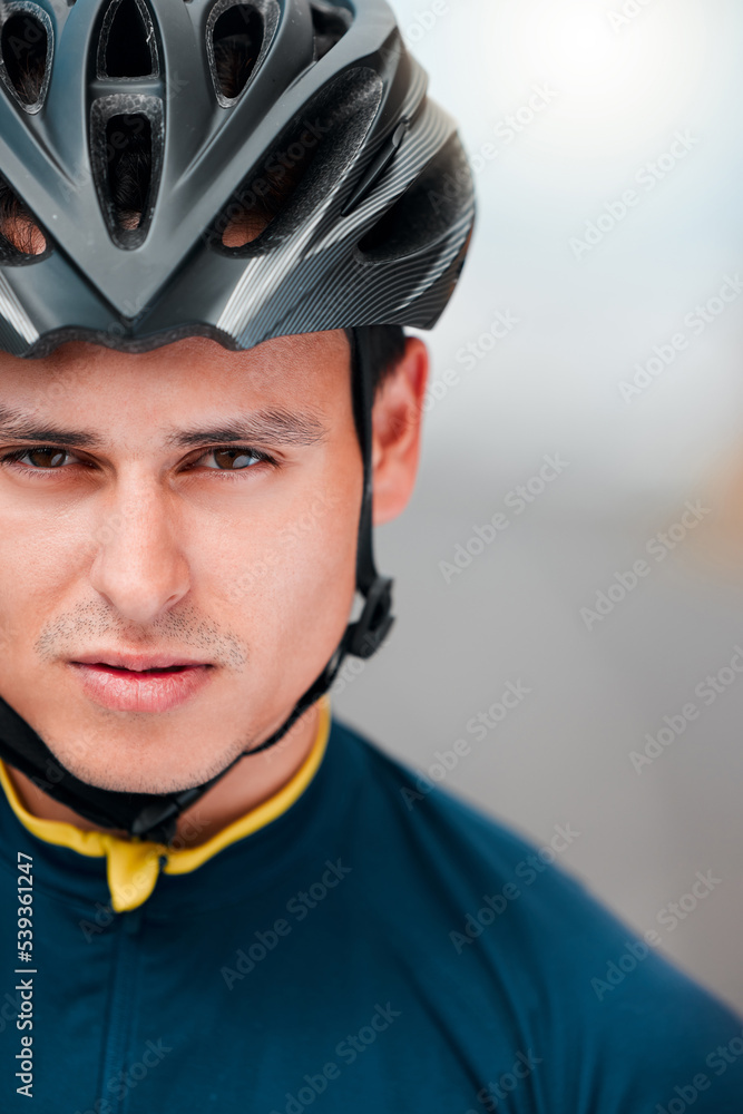 Sports man, cycling and face of cyclist looking ready, cool and determined while training outdoors. Mindset, motivation and portrait of athlete biking outside, proud, serious and fitness goal Sports man, cycling and face of cyclist looking ready, cool and determined while training outdoors. Mindset, motivation and portrait of athlete biking outside, proud, serious and fitness goal