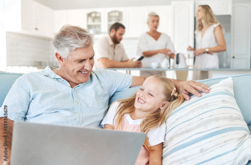Laptop, child and grandfather with comic video on the Internet and the living room sofa of their house. Girl with smile for subscription service on tech with funny movies and an elderly man Laptop, child and grandfather with comic video on the Internet and the living room sofa of their house. Girl with smile for subscription service on tech with funny movies and an elderly man