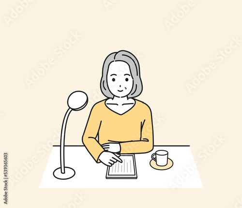 タブレットで電子書籍を読む中年の女性のイラスト