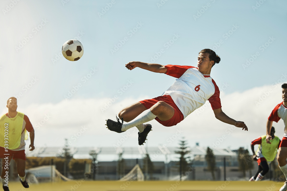 During the game, a soccer player kicked the ball