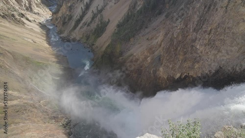 Brink Of The Lower Falls Waterfall View and Yellowstone River at Grand Canyon of the Yellowstone National Park, Wyoming photo