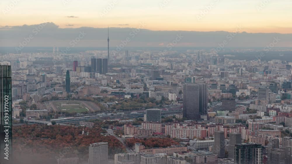 Aerial view of districts with Ostankino Tower in Moscow from Moscow City Skyscrapers. Time-lapse. Aerial view of districts with Ostankino Tower in Moscow from Moscow City Skyscrapers. Time-lapse.