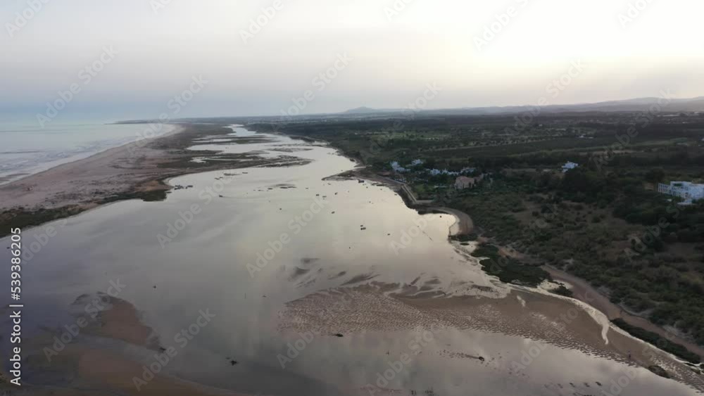 Praia da Fabrica, a sandy barrier island at the mouth of the Ria Formosa in Portugal - aerial drone shot Praia da Fabrica, a sandy barrier island at the mouth of the Ria Formosa in Portugal - aerial drone shot