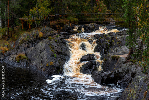 Picturesque waterfall in Ruskeala in autumn, Karelia, Russia photo