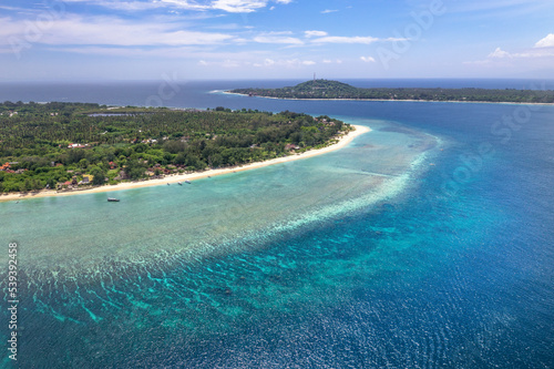 Aerial view of Gili Meno and Gili Trawangan - coral tropical islands located at West Nusa Tenggara area, Indonesia