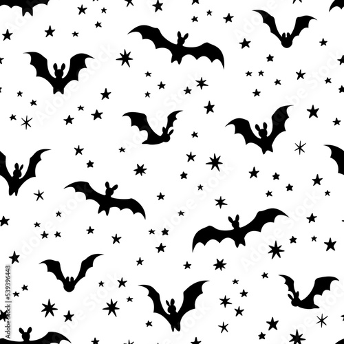 Vector seamless pattern with bats and stars. Halloween design for wrappings  textile  wallpaper and backgrounds.