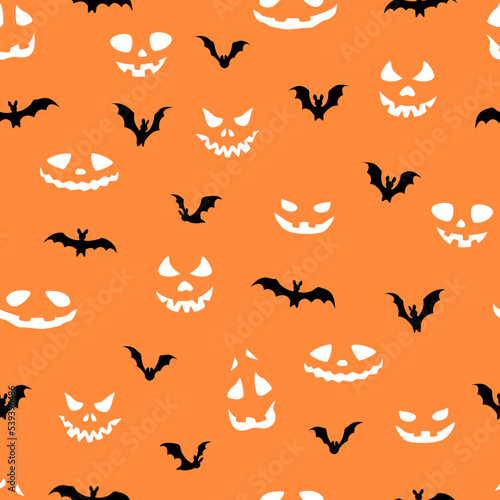 Vector seamless pattern with bats and scary faces. Halloween design for wrappings, textile, wallpaper and backgrounds.
