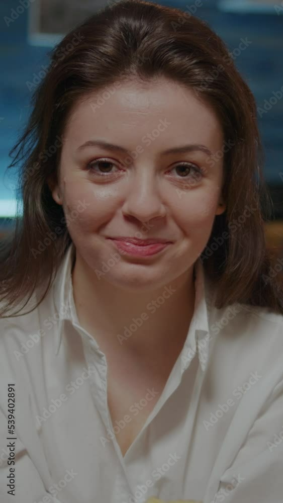Vertical video: Portrait of young woman holding bowl of chips sitting on sofa at home. Person with takeaway food order of table looking at camera feeling hungry, preparing to eat fast food meal Vertical video: Portrait of young woman holding bowl of chips sitting on sofa at home. Person with takeaway food order of table looking at camera feeling hungry, preparing to eat fast food meal