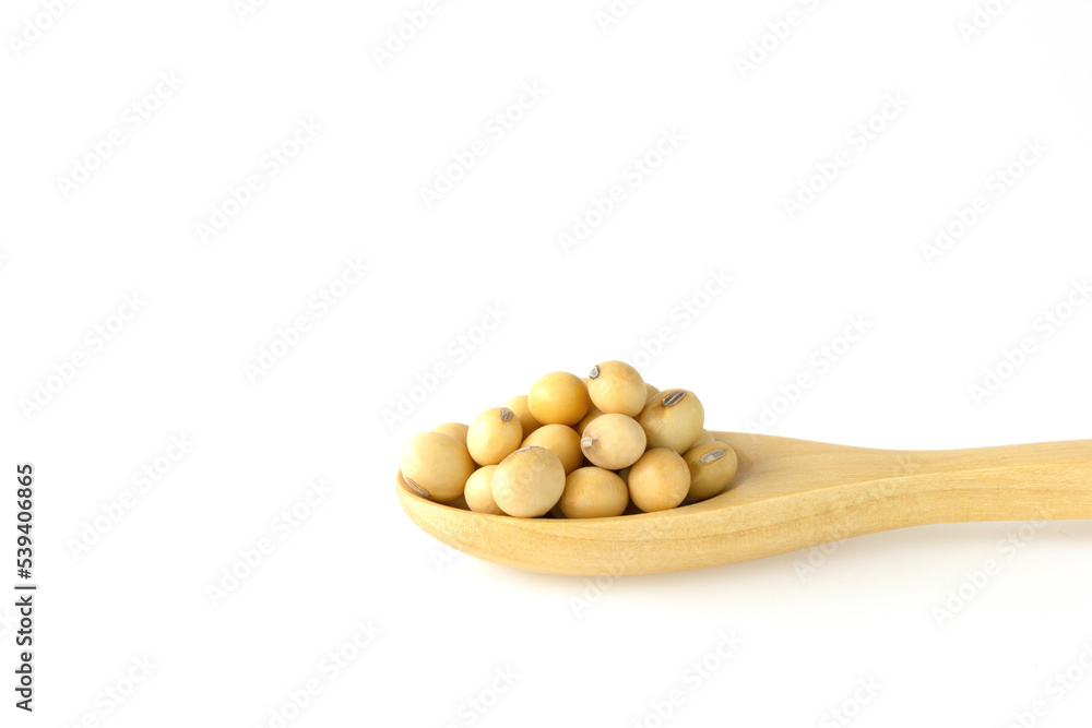 Soybeans on wooden spoon isolated on white background. Soybeans on wooden spoon isolated on white background.
