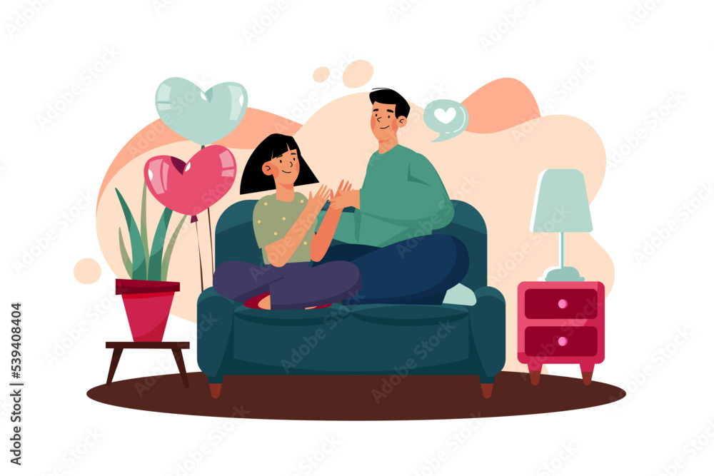 The couple sits and talks a good conversation on a sofa. The couple sits and talks a good conversation on a sofa.