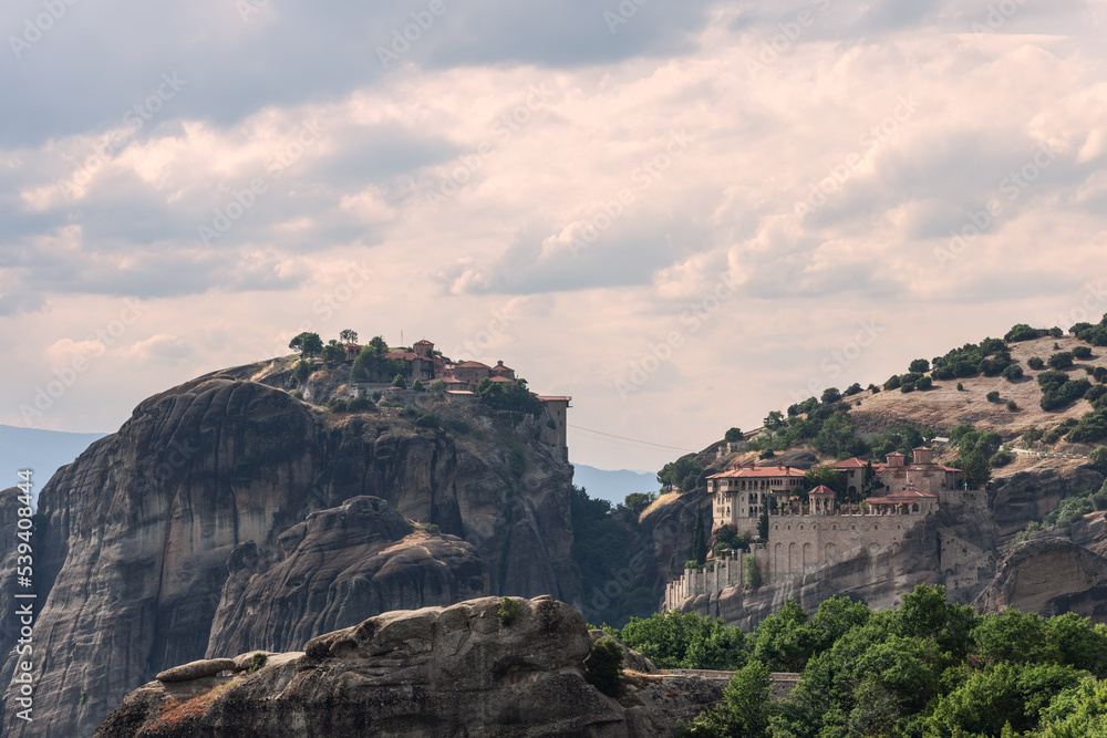 Nature, geology, vegetation, architectural masterpieces, ancient relics, art, iconography, faith in God, and gigantic human efforts united here to create this unique area of Meteora complex, Greece.