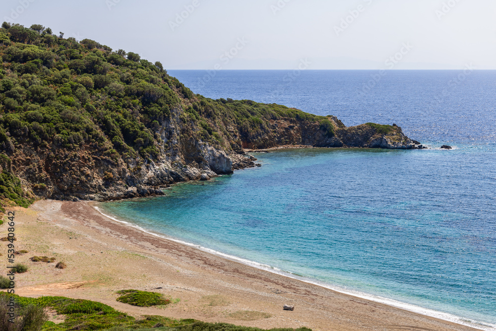 One more charming bay hidden from prying eyes on Aegean coast of Sithonia peninsula with hard-to-reach approach and completely deserted beach. Toroni, Chalkidiki, Greece