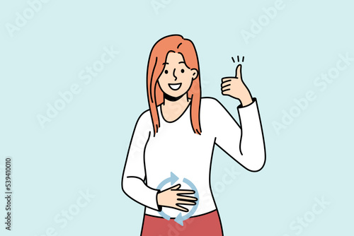 Happy girl feeling good herself after eating. Young lady has healthy digestion, holds hand on her stomach, shows like gesture. Female student has well nutrition. Vector outline illustration in color.