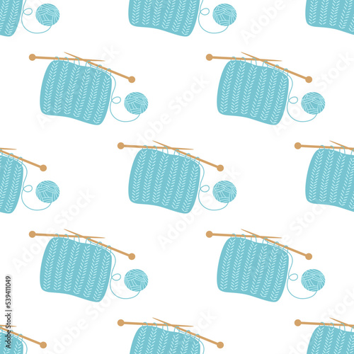 seamless pattern of cartoon knitting cloth with knitting needles